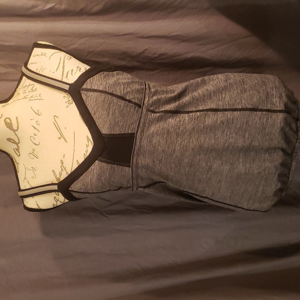 Lululemon tanktop size 12 grey and black with pocket v neck
